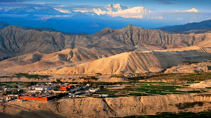 Upper Mustang trek in Nepal during monsoon season with dry landscapes and Tibetan culture