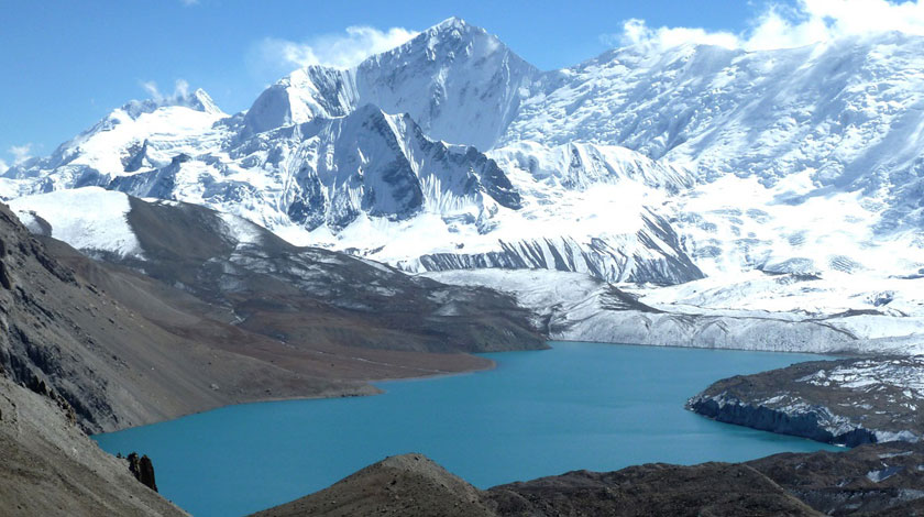 Tilicho Lake, one of the highest lakes in the world, located in the Annapurna region of Nepal with turquoise waters