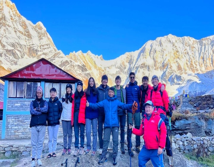 Scenic Himalayan view from the Annapurna Base Camp trek via Poon Hill, featuring mountain landscapes and trekking trails in Nepal.