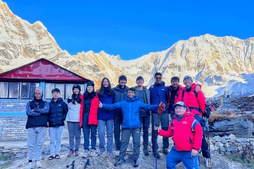 Group of trekkers at Annapurna Base Camp during the Annapurna Base Camp Trek 5 Days