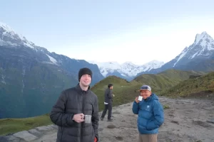 Enjoying tea with the view from the Mardi Himal view point with Ruby alpine team