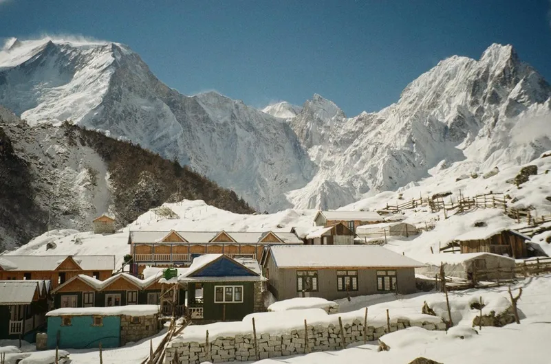 Snow-covered Bhimdhang Village on the Manaslu Circuit Trek in Nepal.